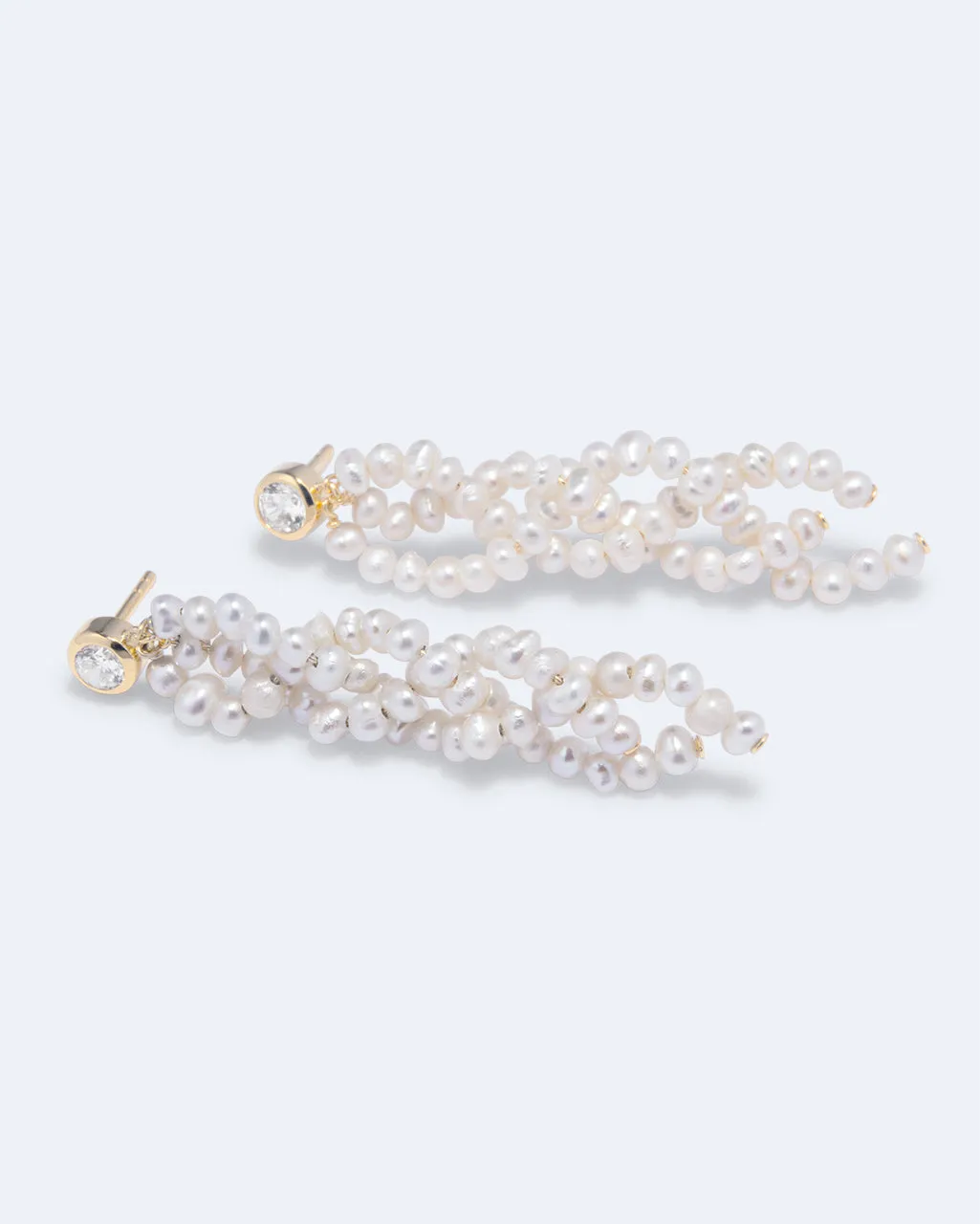 Completedworks Negotiation boucles perle zircon