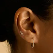 Astrid & Miyu Star Curved clou piercing or blanc massif