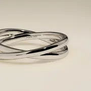 Astrid & Miyu Crossover Illusion Band bague argent entrelacée