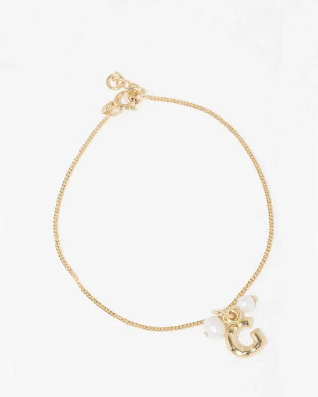 Completedworks Classicworks G bracelet perle lettre G vermeil