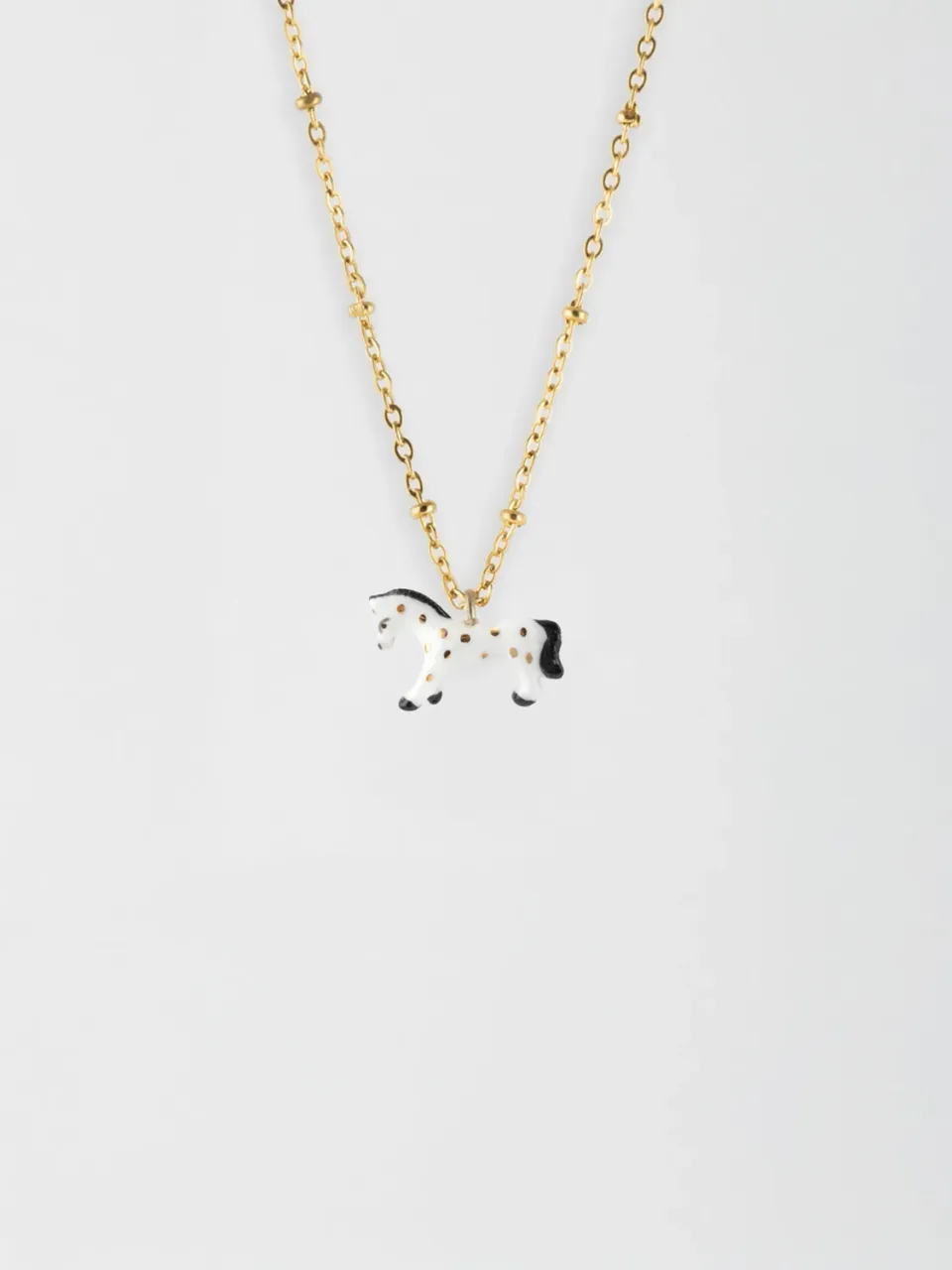 Nach Bijoux cheval blanc collier porcelaine 41 cm doré