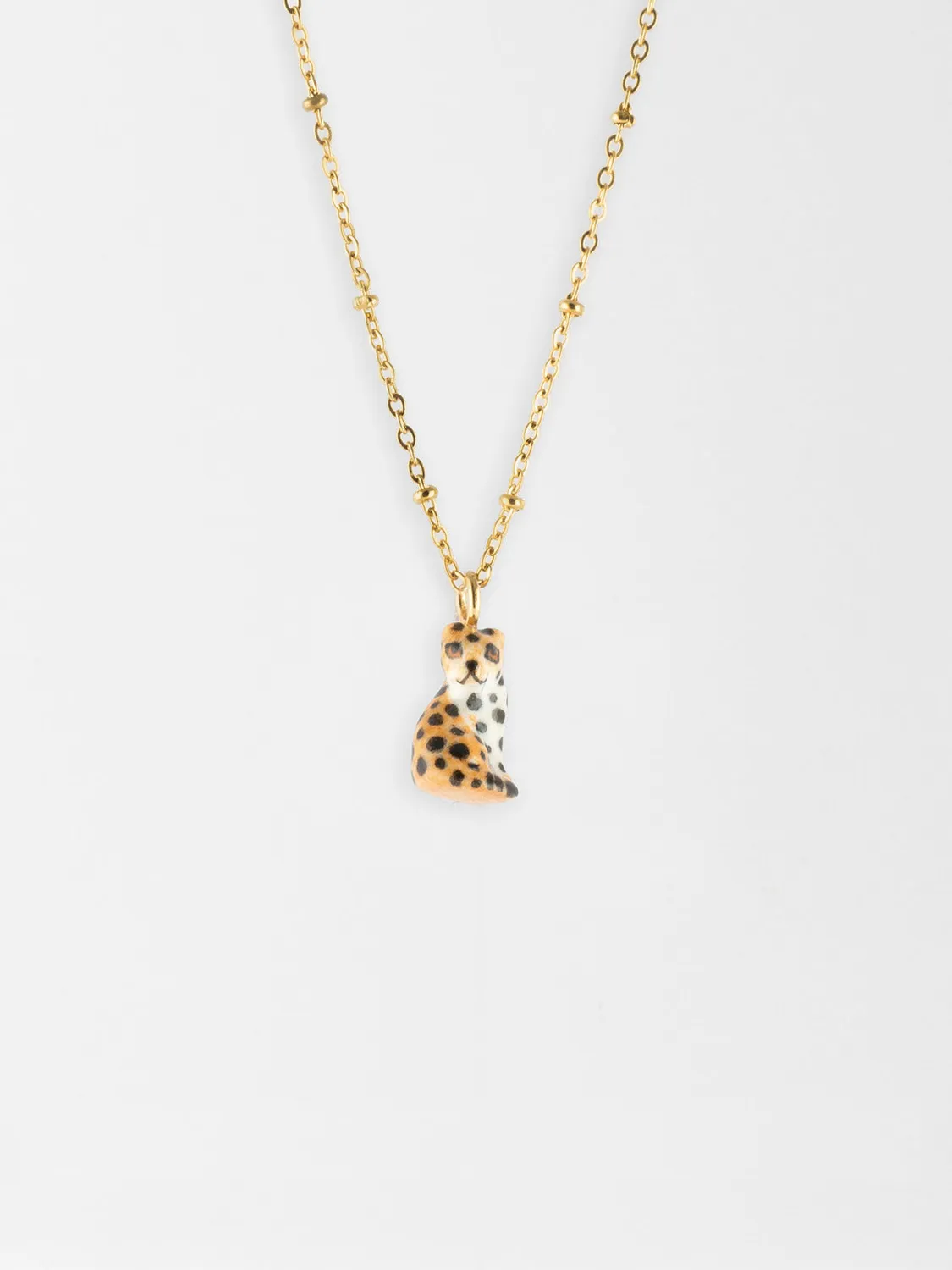 Nach Bijoux léopard assis collier porcelaine perles verre