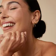 Astrid & Miyu Twist Huggies boucles or massif alexandrite