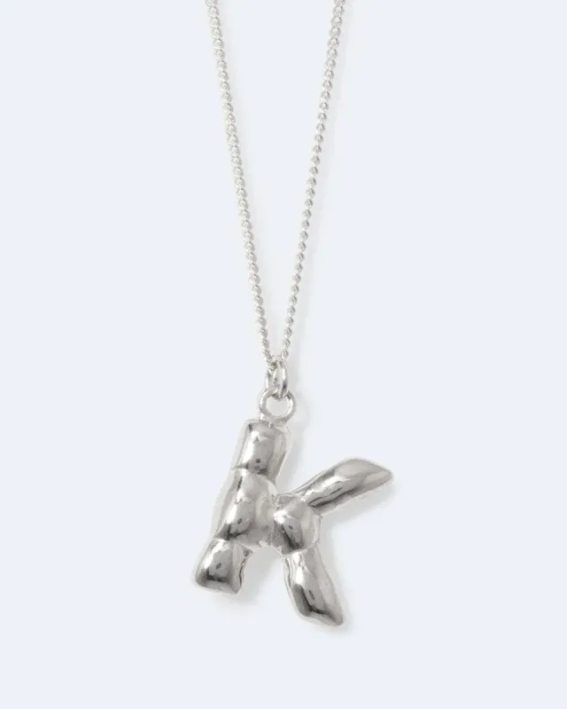 Completedworks Classicworks K collier initiale argent recyclé