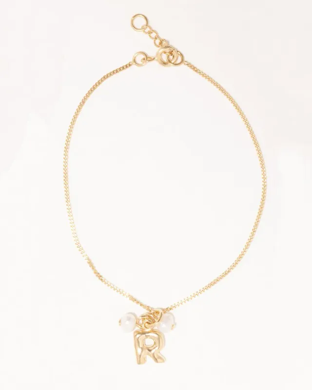 Completedworks Classicworks R bracelet perles vermeil or