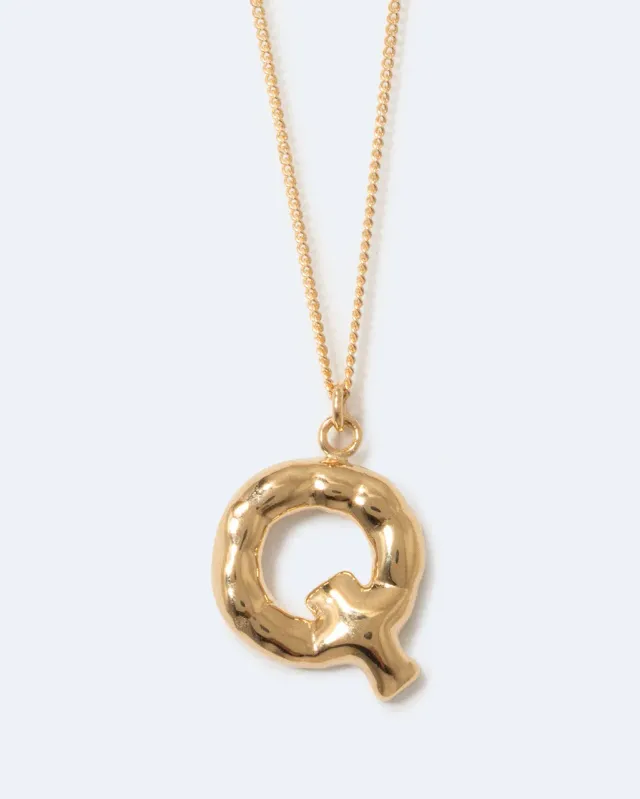 Completedworks Classicworks Q collier lettre plaqué or
