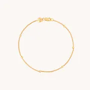 Astrid & Miyu Illusion bracelet double chaîne doré fin