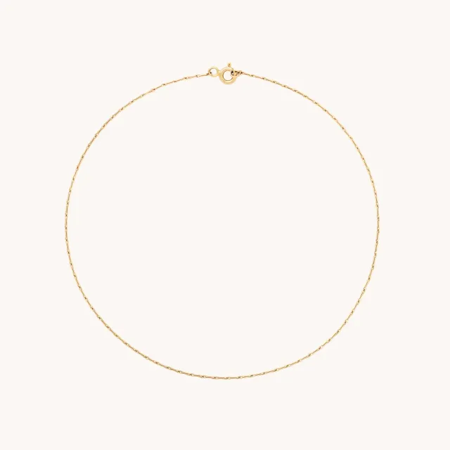 Astrid & Miyu Marylebone Chain bracelet cheville or massif fin