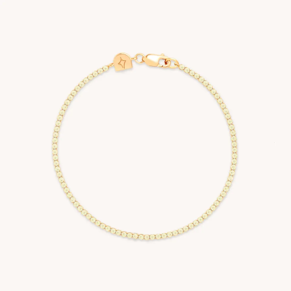 Astrid & Miyu Green Tennis bracelet doré pierres vertes