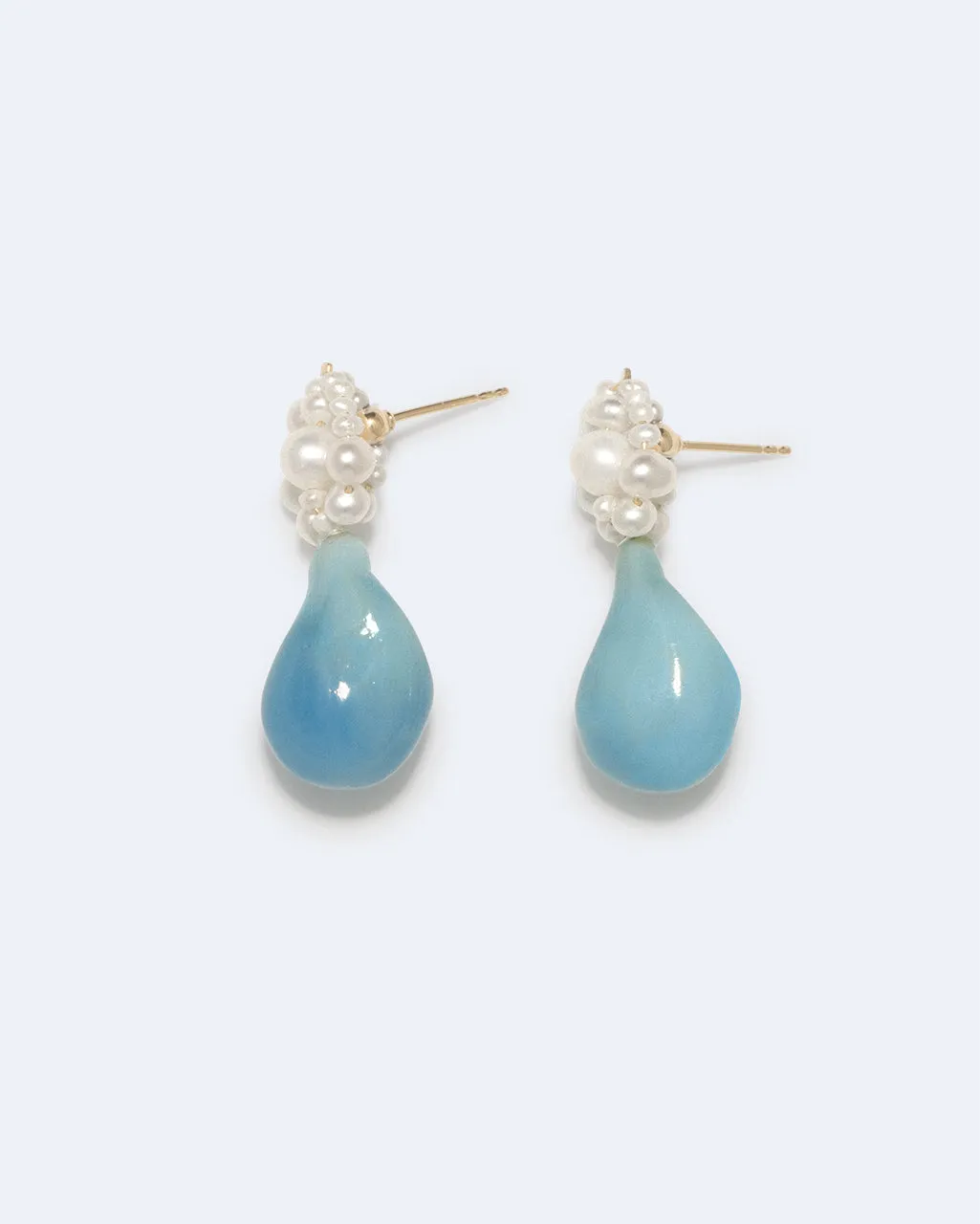 Completedworks Tra-la-la boucles perle résine bleue