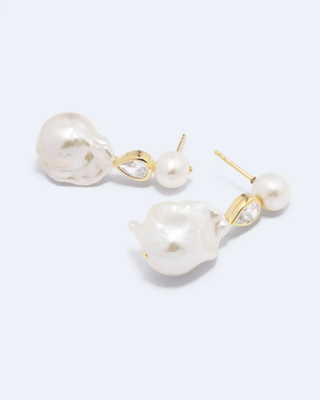 Completedworks Pulp boucles perle zircone mi-longues