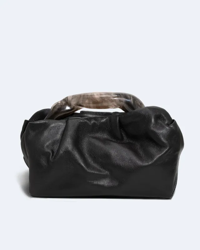 Completedworks Lunchbox pochette cuir noir résine fumée