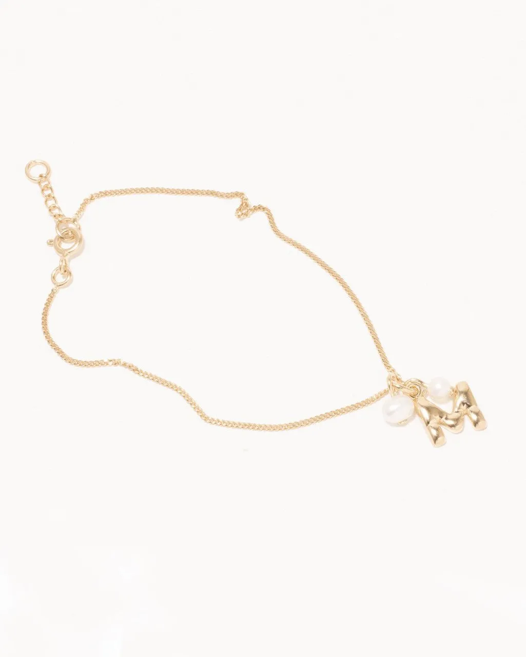 Completedworks Classicworks M bracelet perles vermeil or