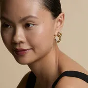 Astrid & Miyu Bow piercing titane doré nœud