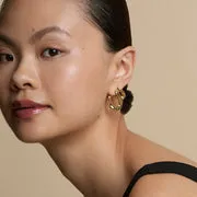 Astrid & Miyu Bow piercing titane doré nœud