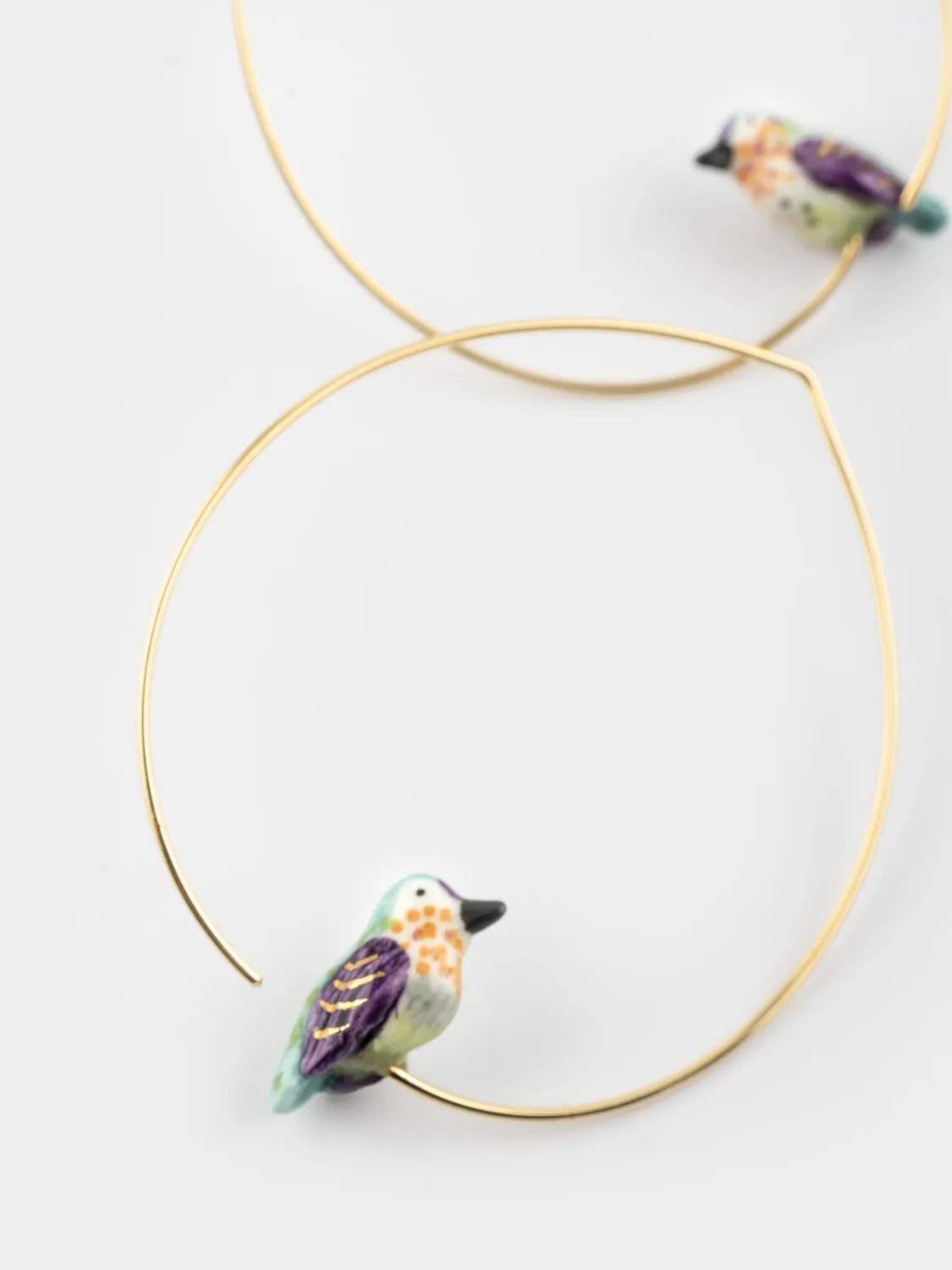Nach Bijoux colibri d'Anna moyennes créoles porcelaine