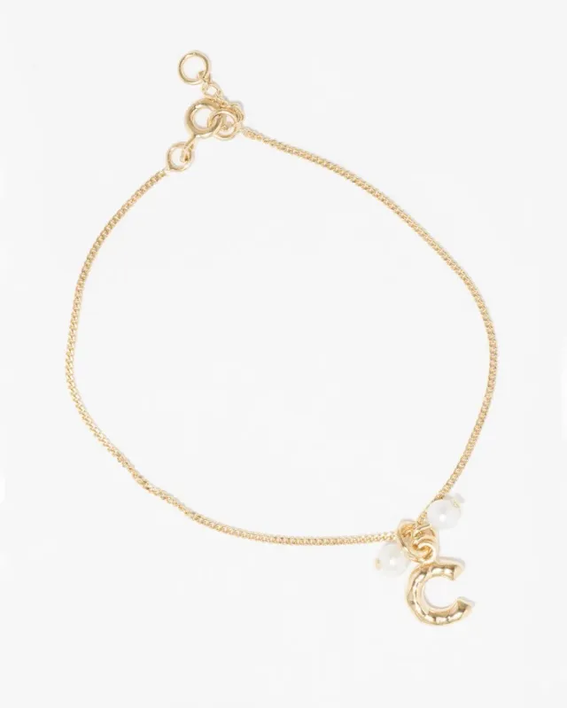 Completedworks Classicworks C bracelet perle vermeil doré