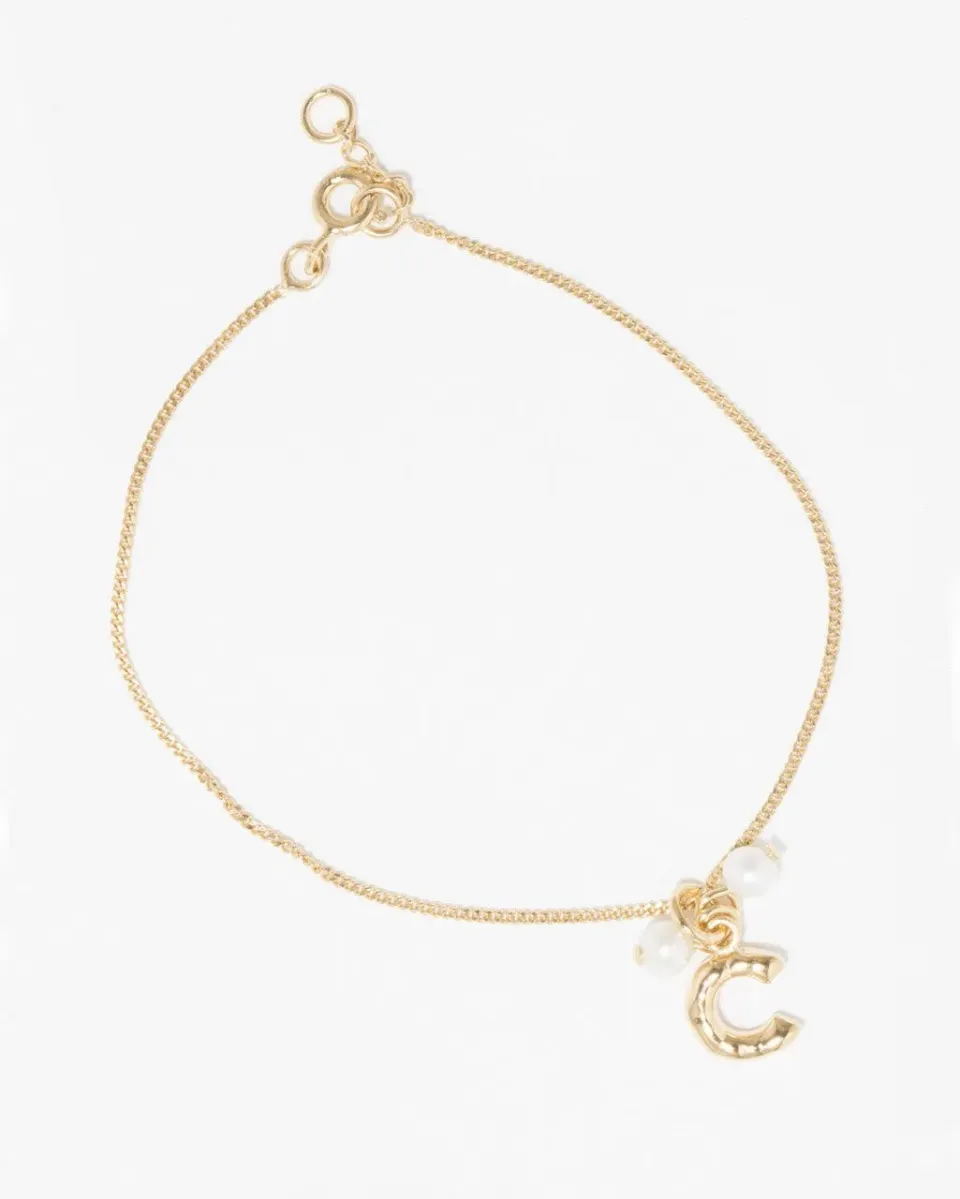 Completedworks Classicworks C bracelet perle vermeil doré