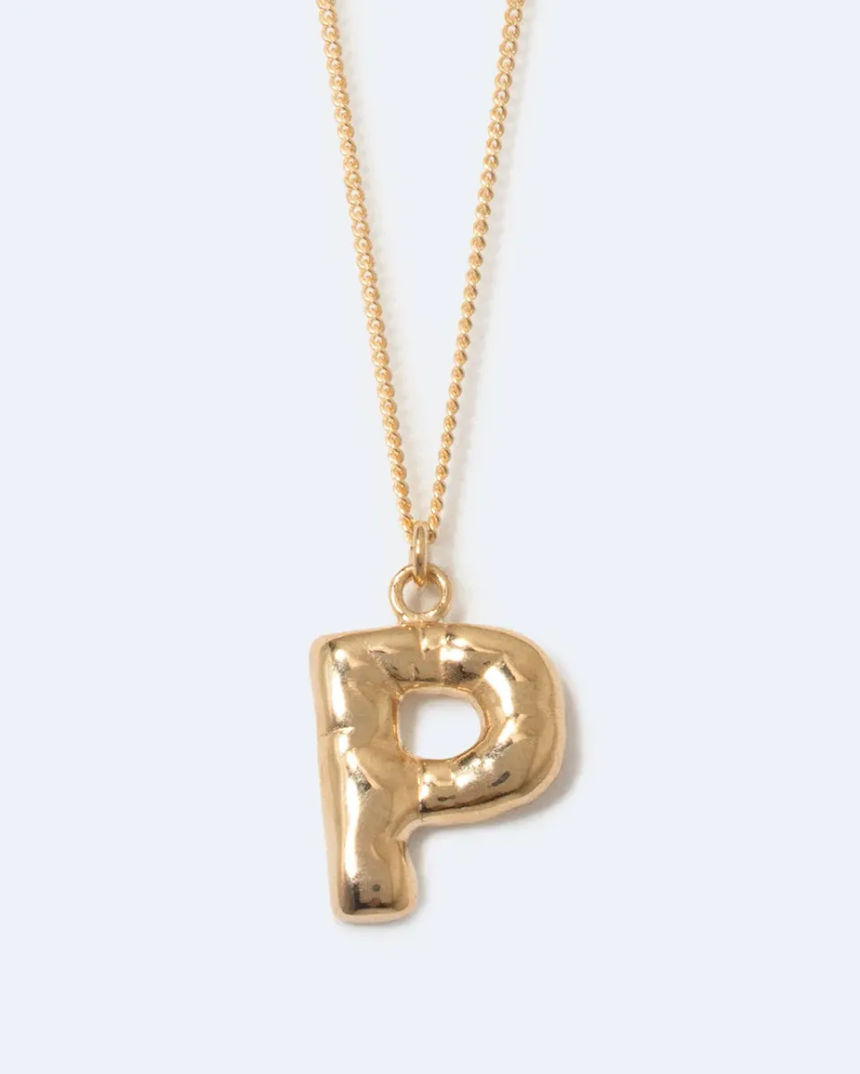 Completedworks Classicworks P collier plaqué or initial