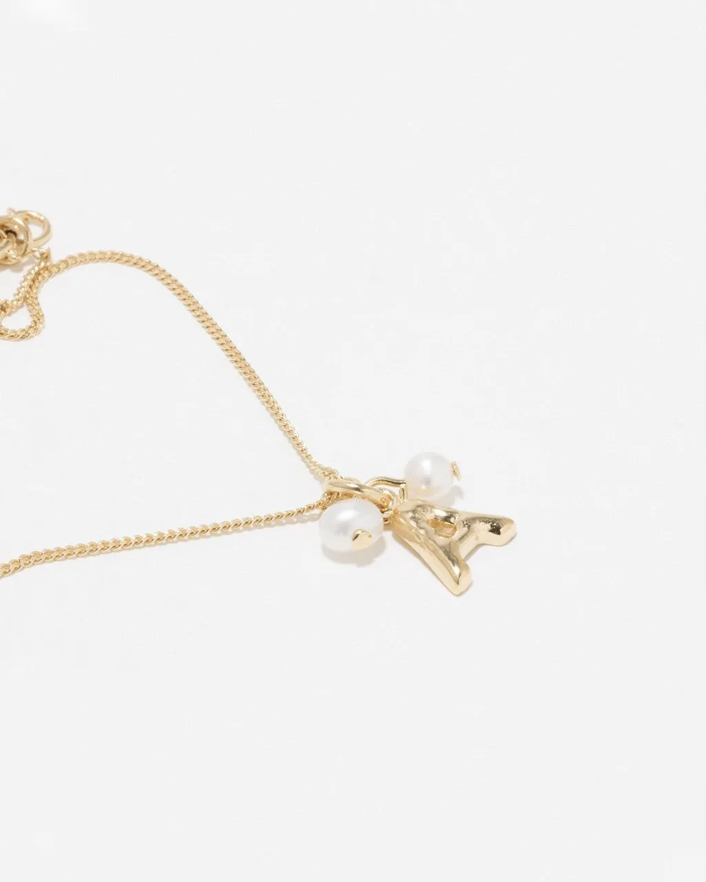 Completedworks Classicworks A bracelet perle vermeil doré