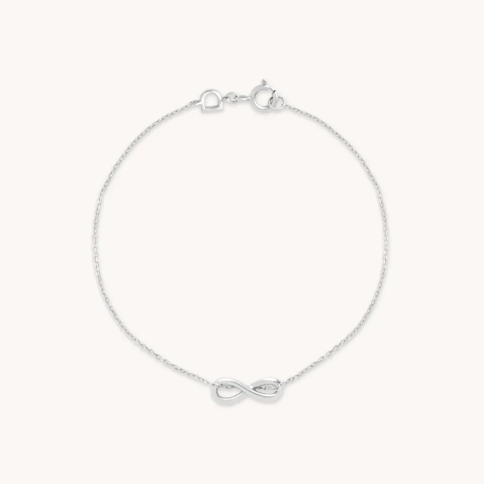 Astrid & Miyu Infinite bracelet or blanc porte-charms