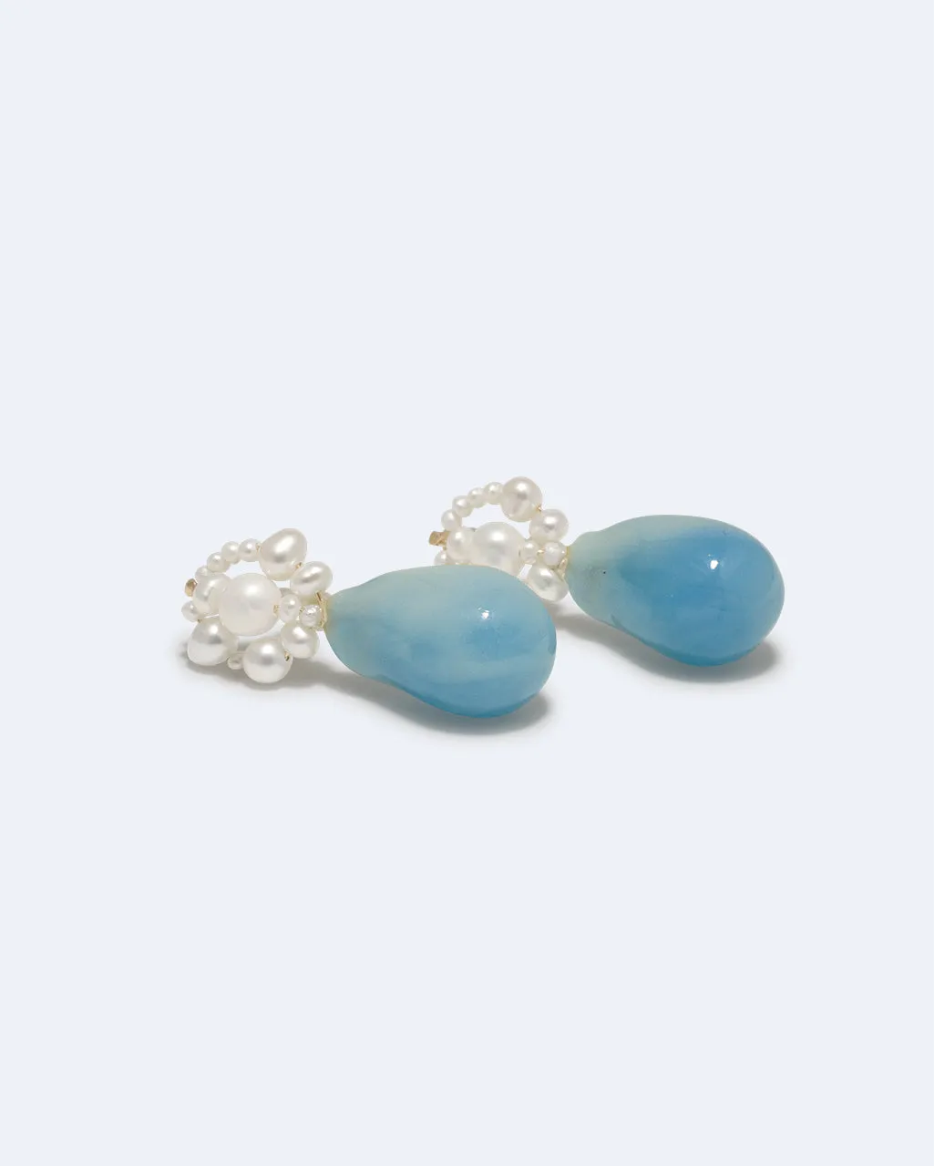 Completedworks Tra-la-la boucles perle résine bleue