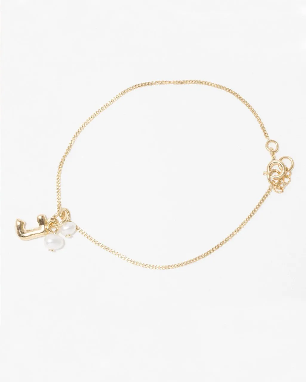 Completedworks Classicworks J bracelet perle doré