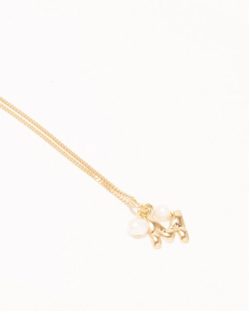 Completedworks Classicworks M bracelet perles vermeil or