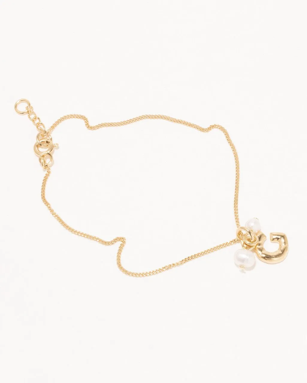 Completedworks Classicworks G bracelet perle lettre G vermeil