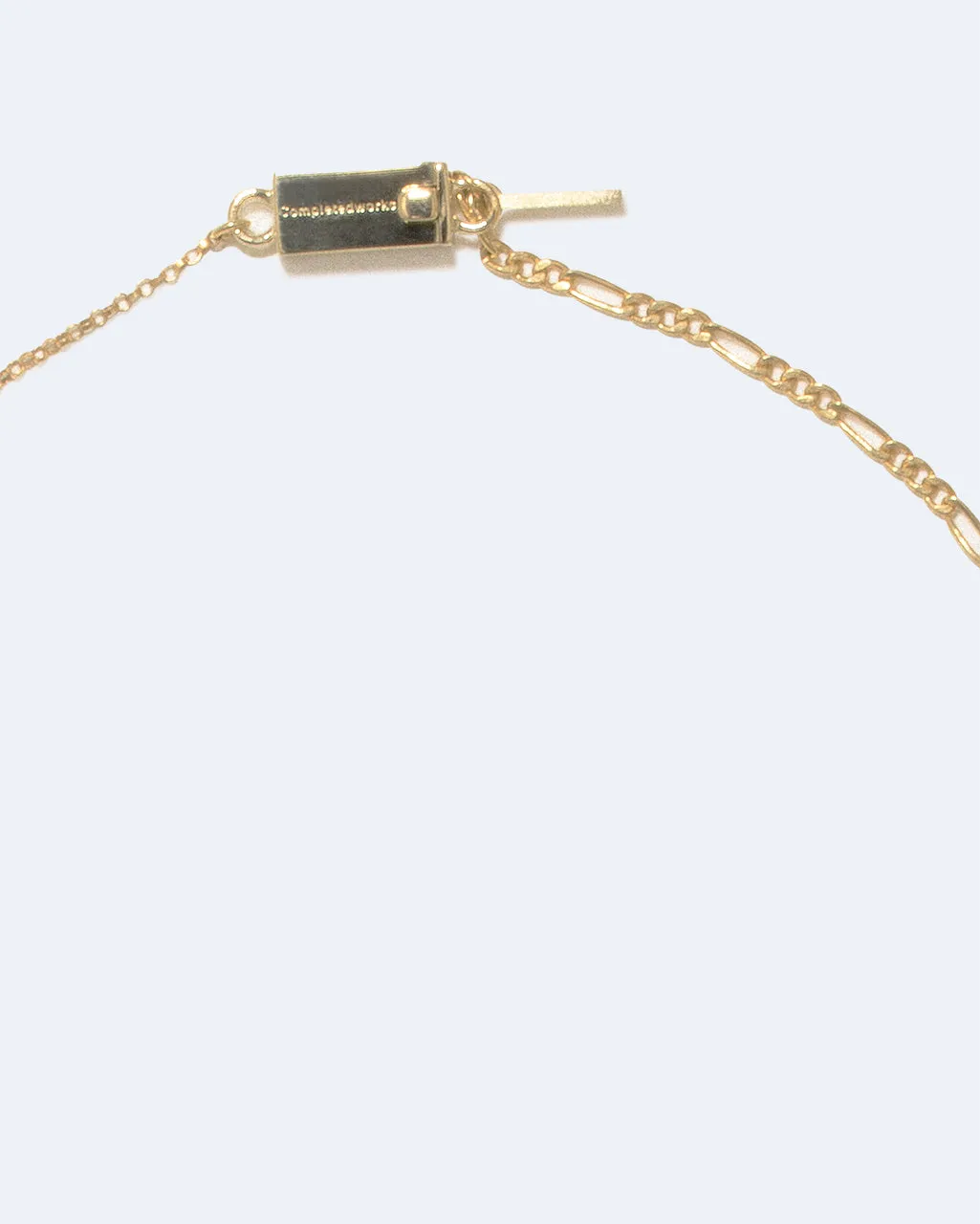 Completedworks H49 collier plaqué or jaune homme