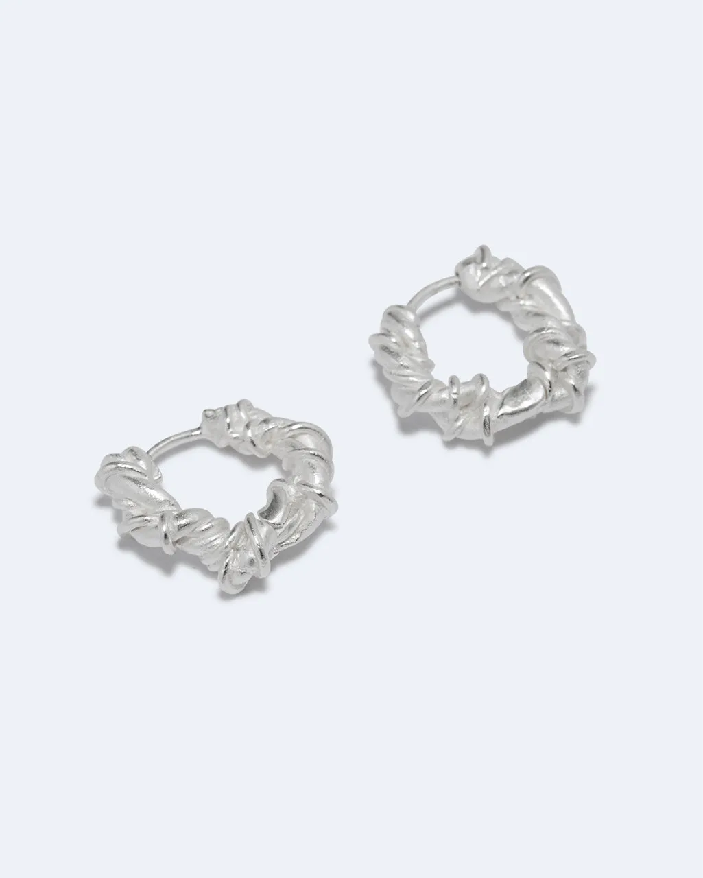 Completedworks Fates Interwoven boucles d'oreilles argenté