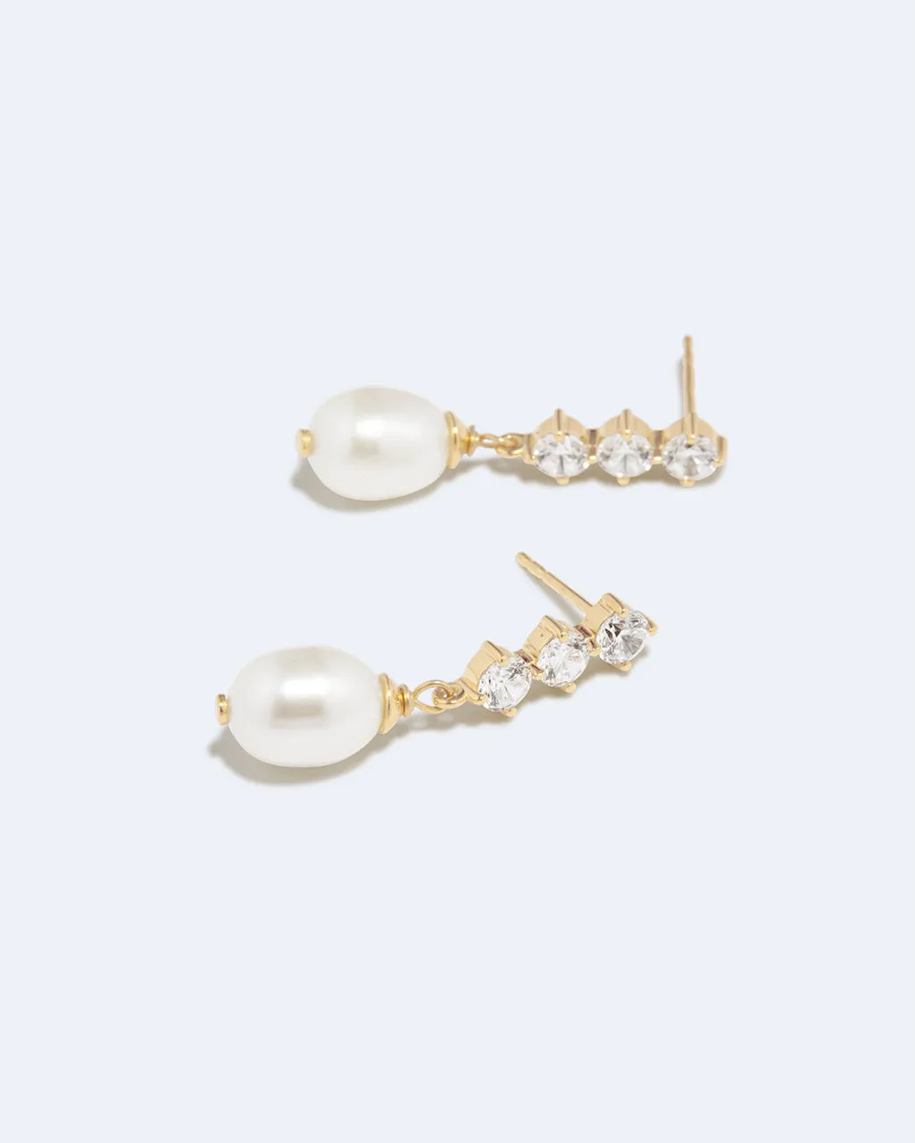 Completedworks Voyage boucles perle zirconia vermeil