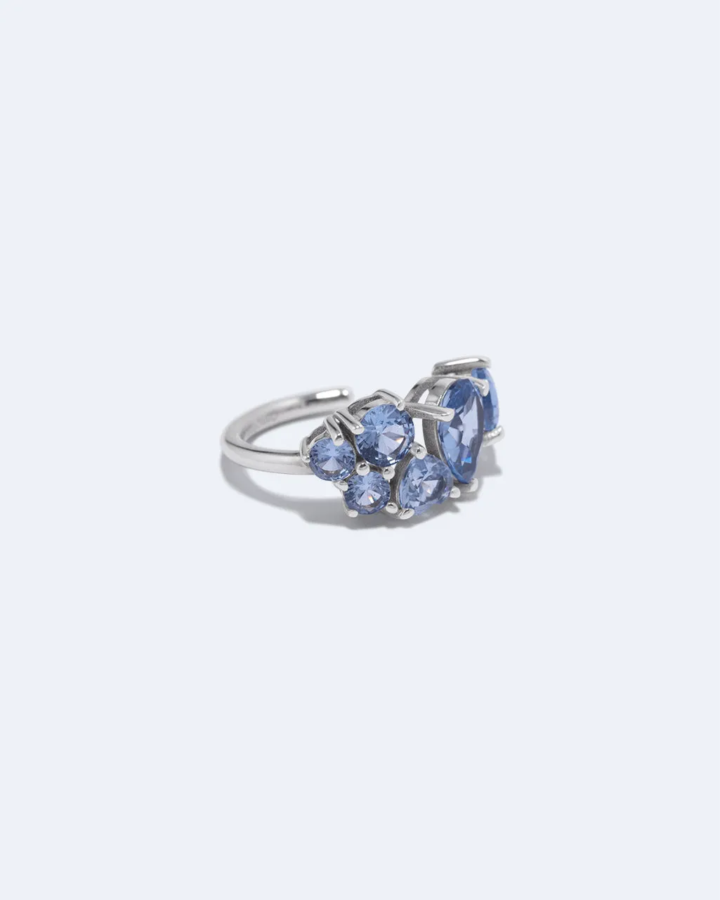 Completedworks Bolt from the Blue manchette oreille argent spinelle bleue