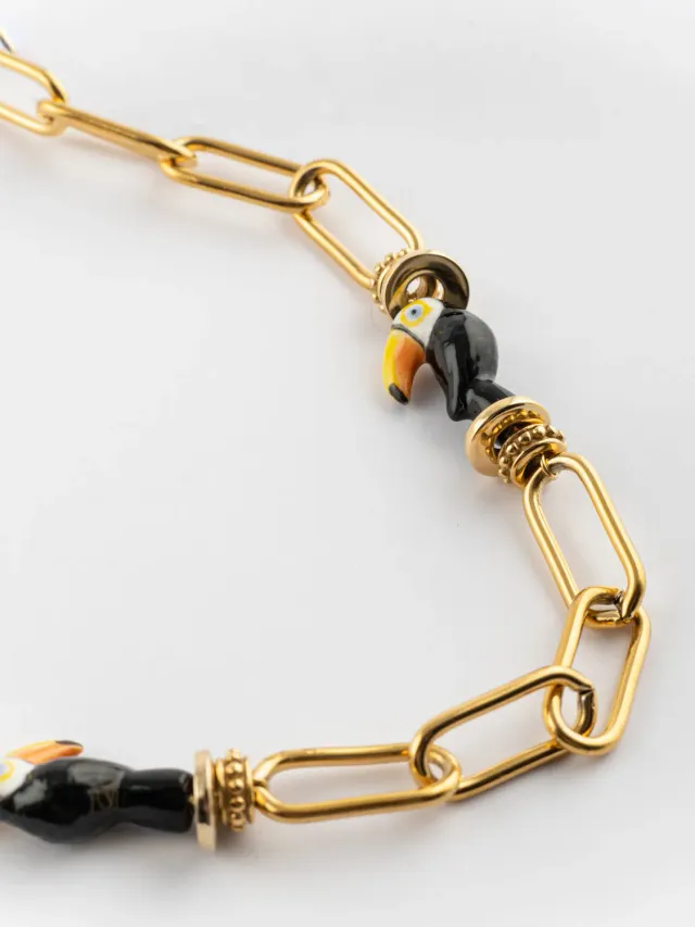 Nach Bijoux chaîne toucan collier porcelaine dorée