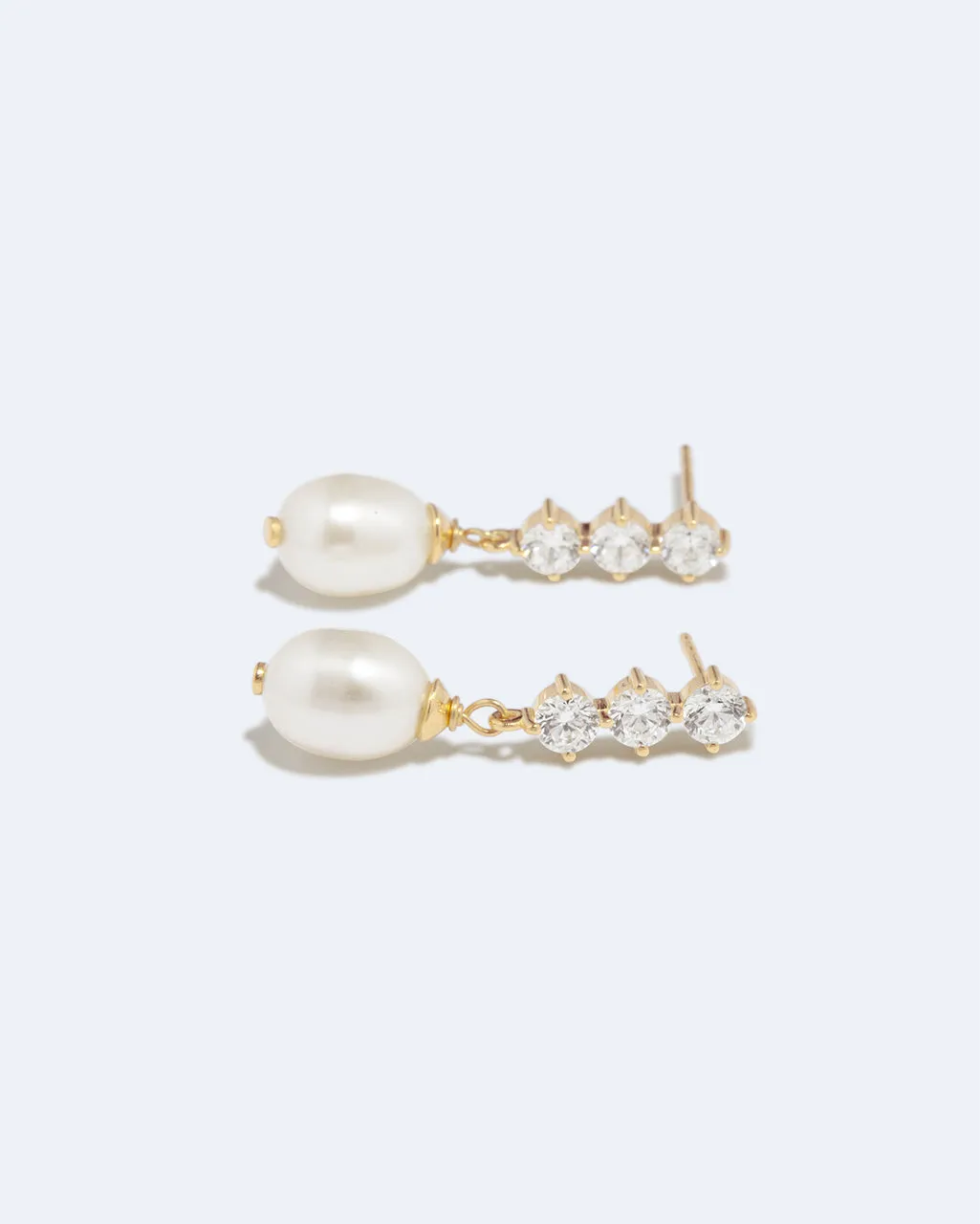 Completedworks Voyage boucles perle zirconia vermeil
