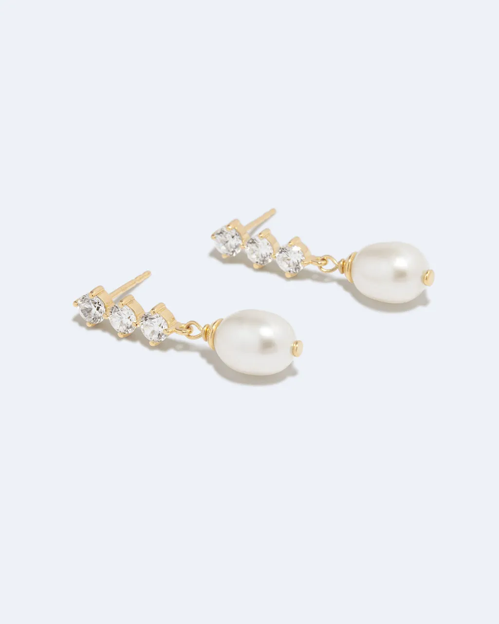 Completedworks Voyage boucles perle zirconia vermeil