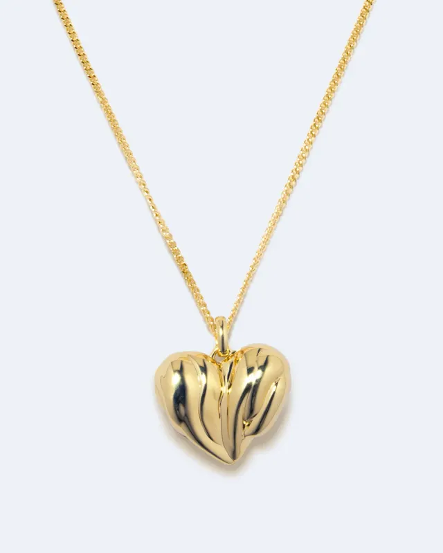 Completedworks Love Don't Lie collier pendentif vermeil doré
