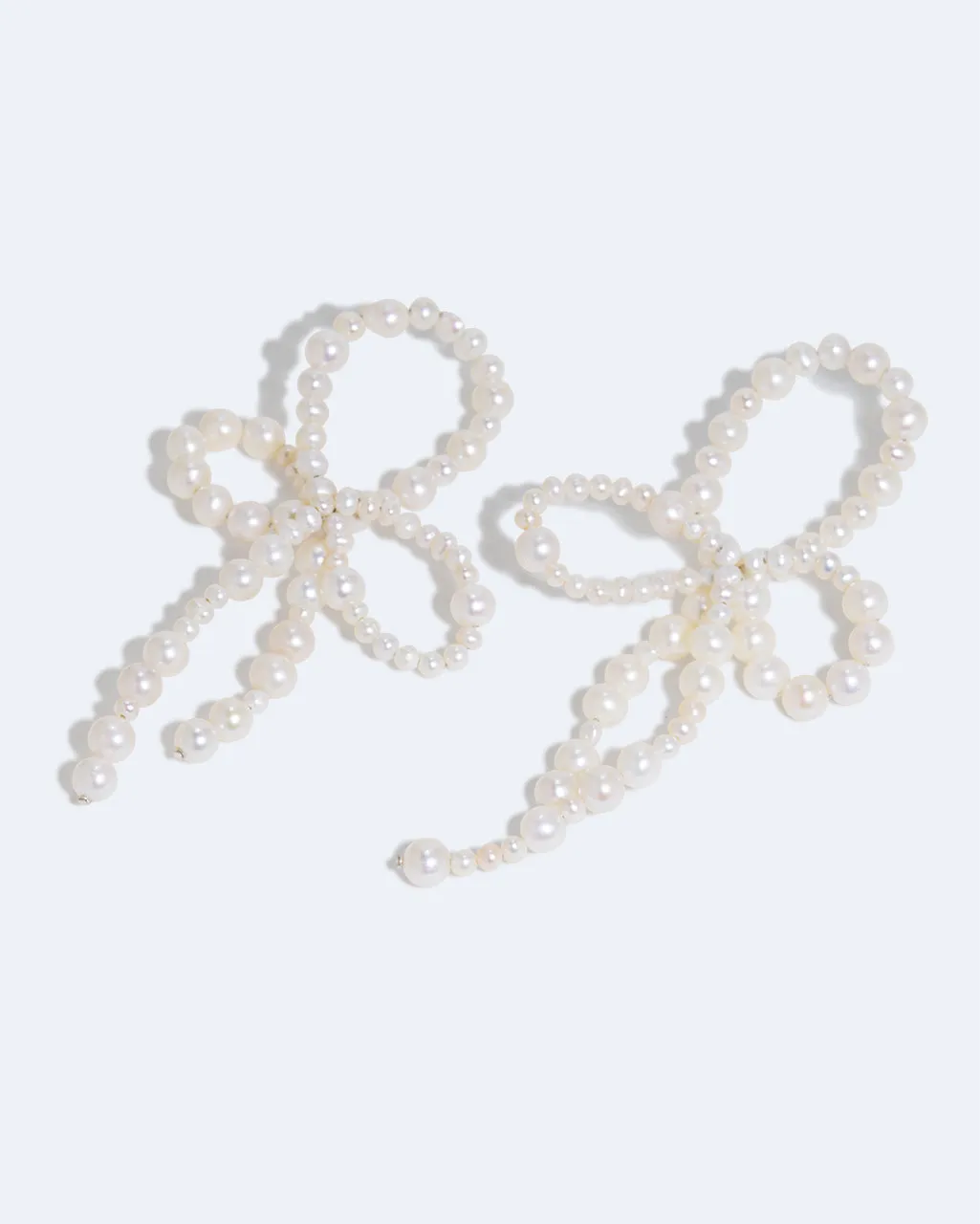Completedworks Loop-the-Loop boucles perle argent