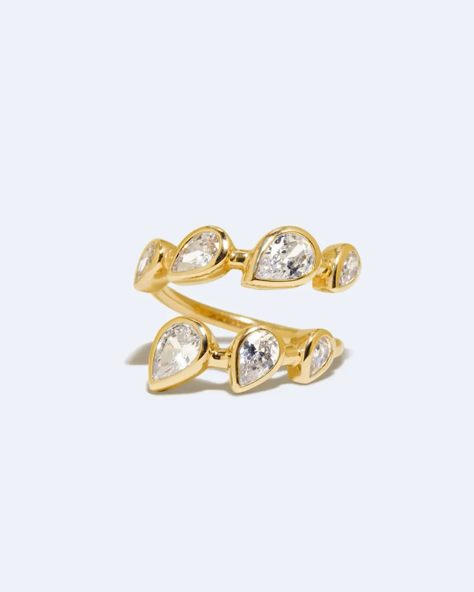 Completedworks Arc bague ouverte zirconia dorée