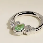 Astrid & Miyu Diamond Green Sapphire Pear Daith Hoop piercing