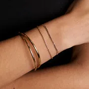 Astrid & Miyu Illusion bracelet double chaîne doré fin