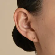 Astrid & Miyu Bow piercing titane doré nœud