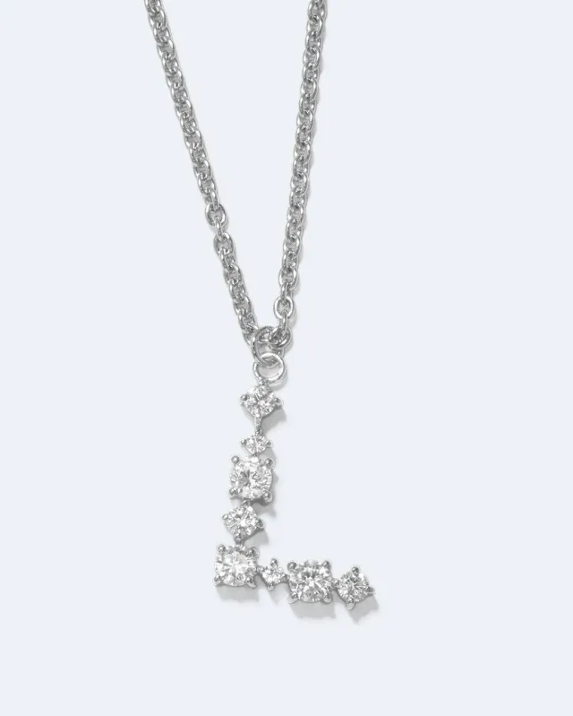 Completedworks Glitchy L pendentif lettre L zirconium rhodié