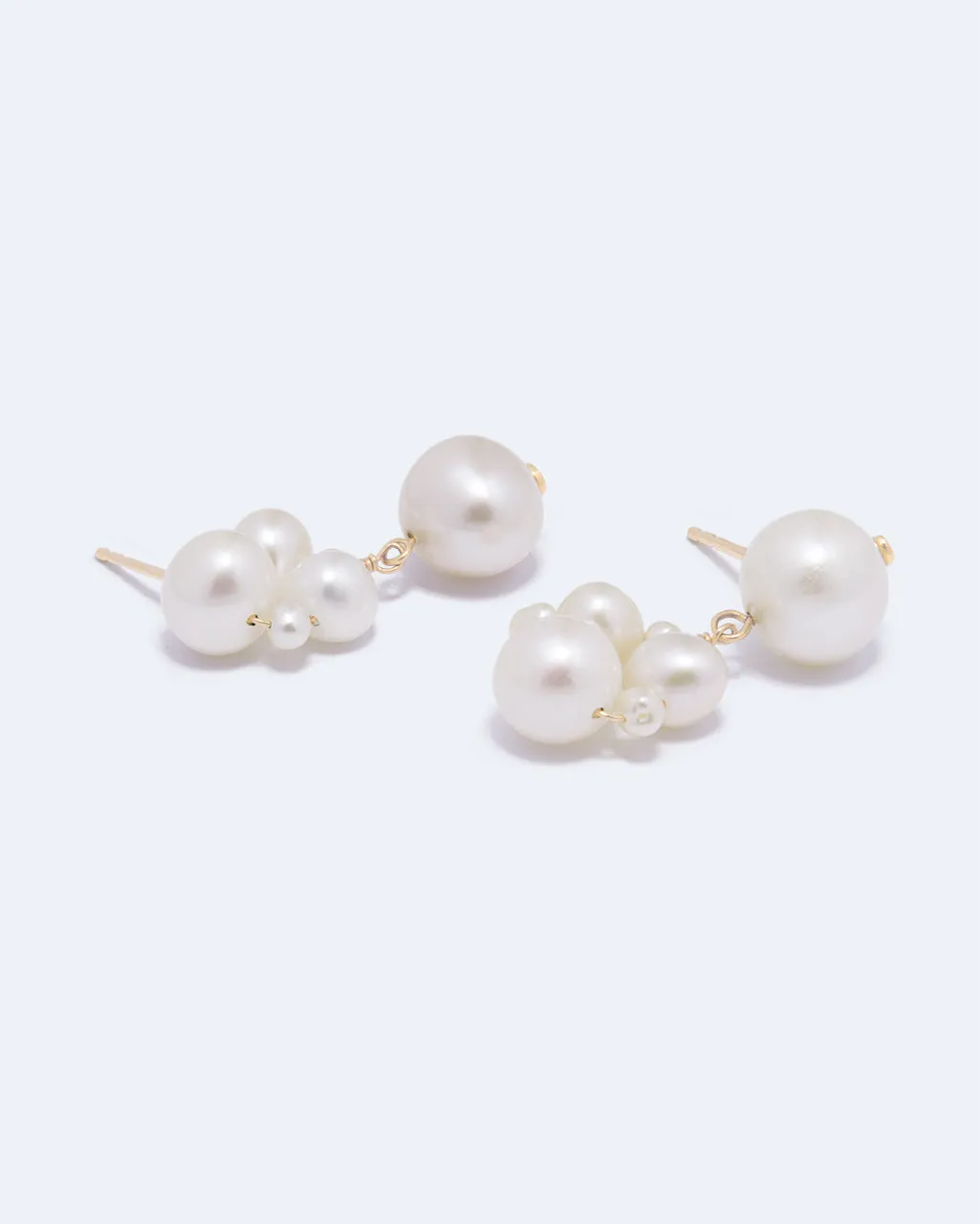 Completedworks Foibles boucles d’oreilles perles plaqué or