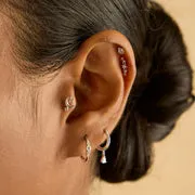 Astrid & Miyu Star Curved clou piercing or blanc massif