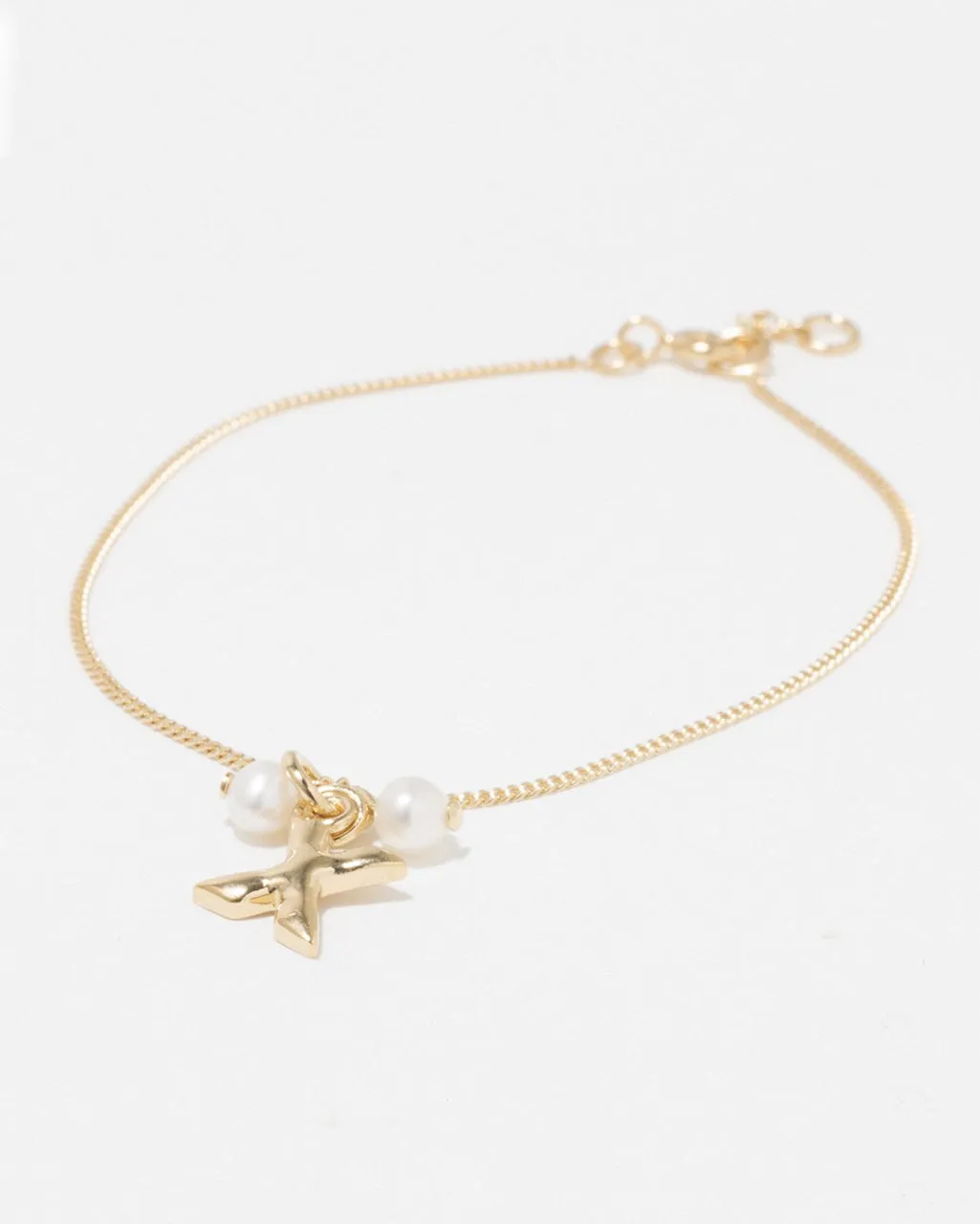 Completedworks Classicworks X bracelet perle vermeil or