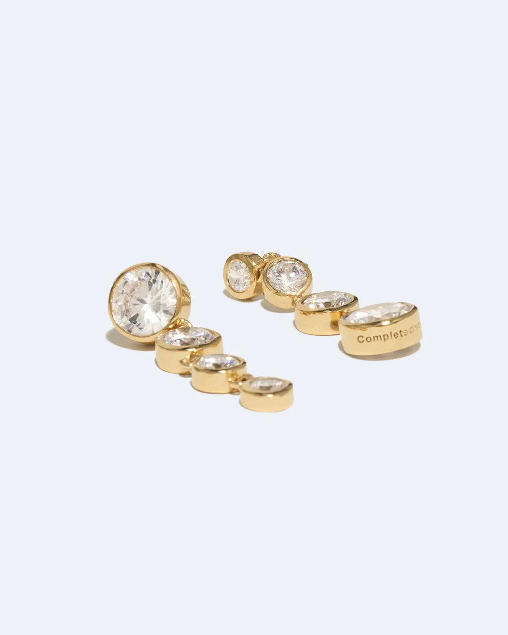 Completedworks Light of the Past II boucles d'oreilles zircone doré