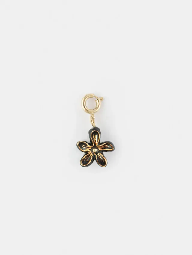 Nach Bijoux Charm fleur d'Erine noire porcelaine dorée