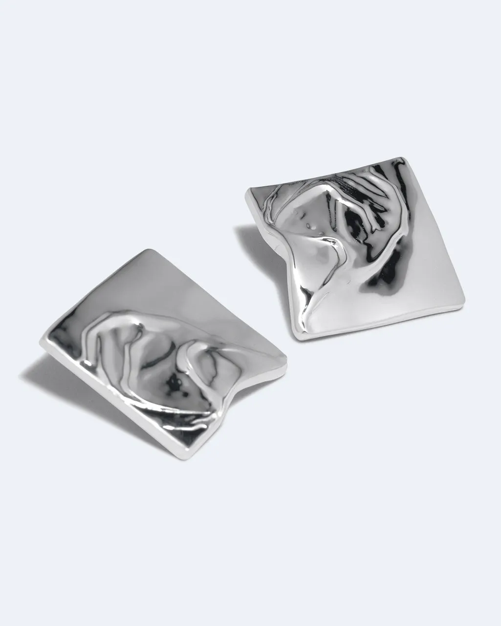 Completedworks Overthinking boucles d’oreilles argent