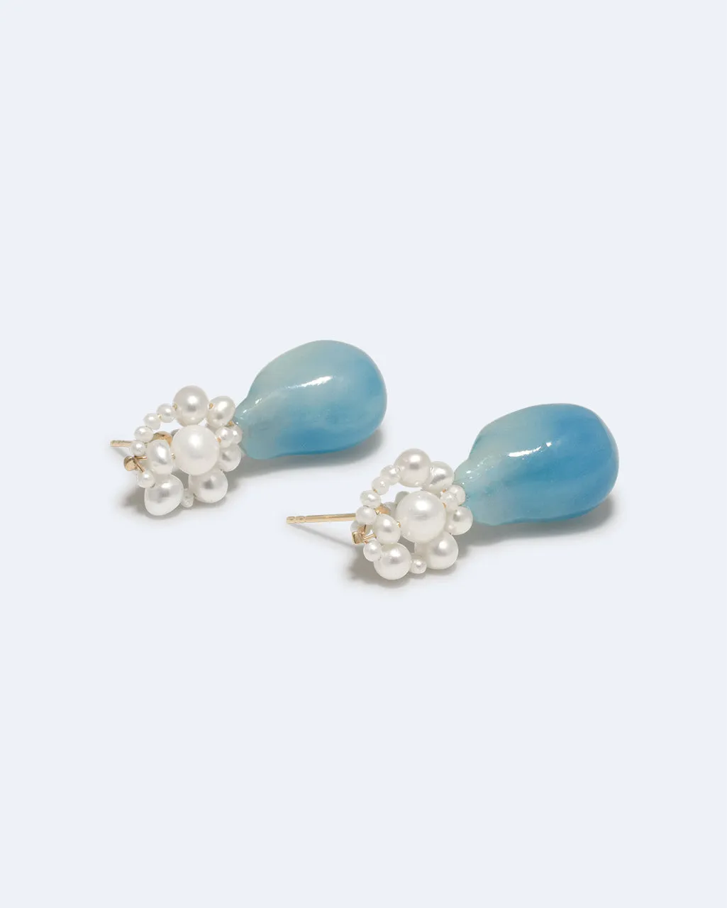 Completedworks Tra-la-la boucles perle résine bleue